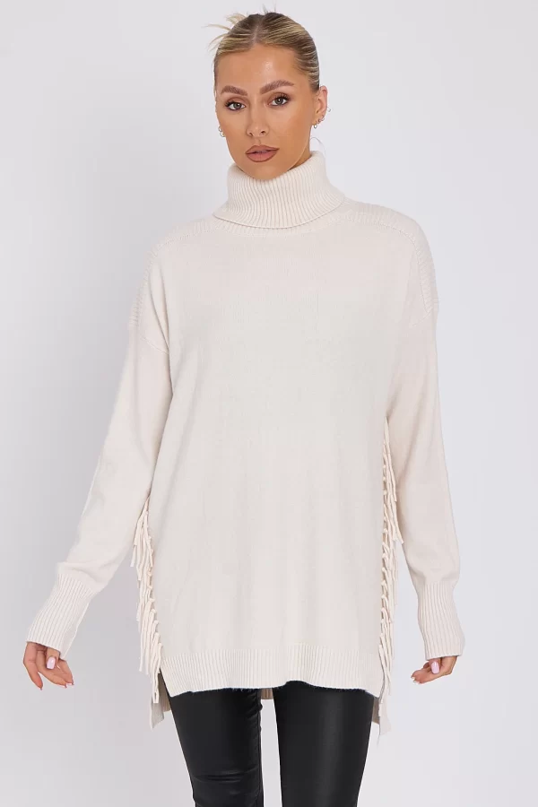 CREAM ROLL NECK JUMPER WITH TASSELS